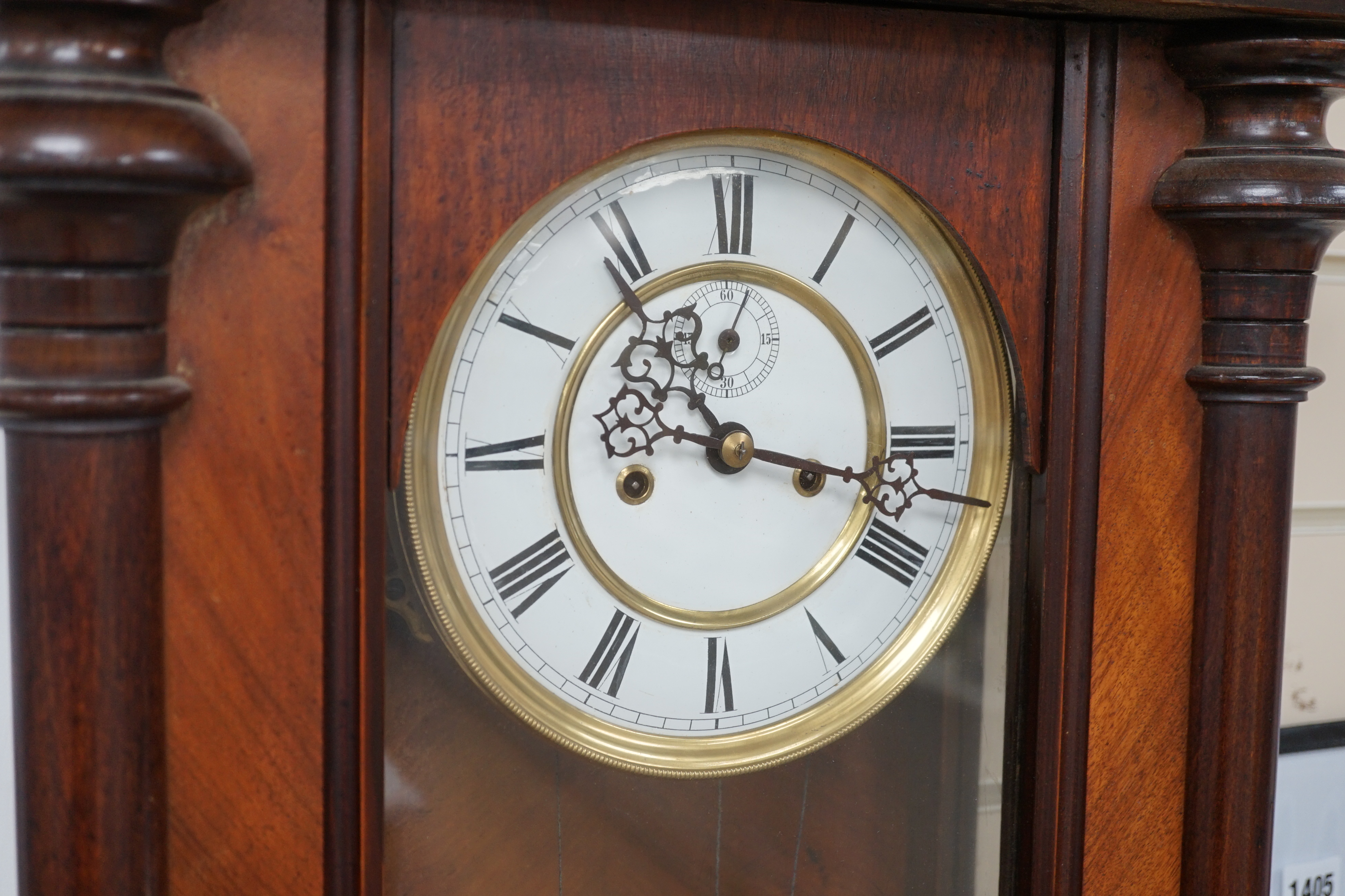 A mahogany Vienna regulator wall clock, approximately 120cm high. Condition - unknown if in working condition, dial good, case has minor scratches